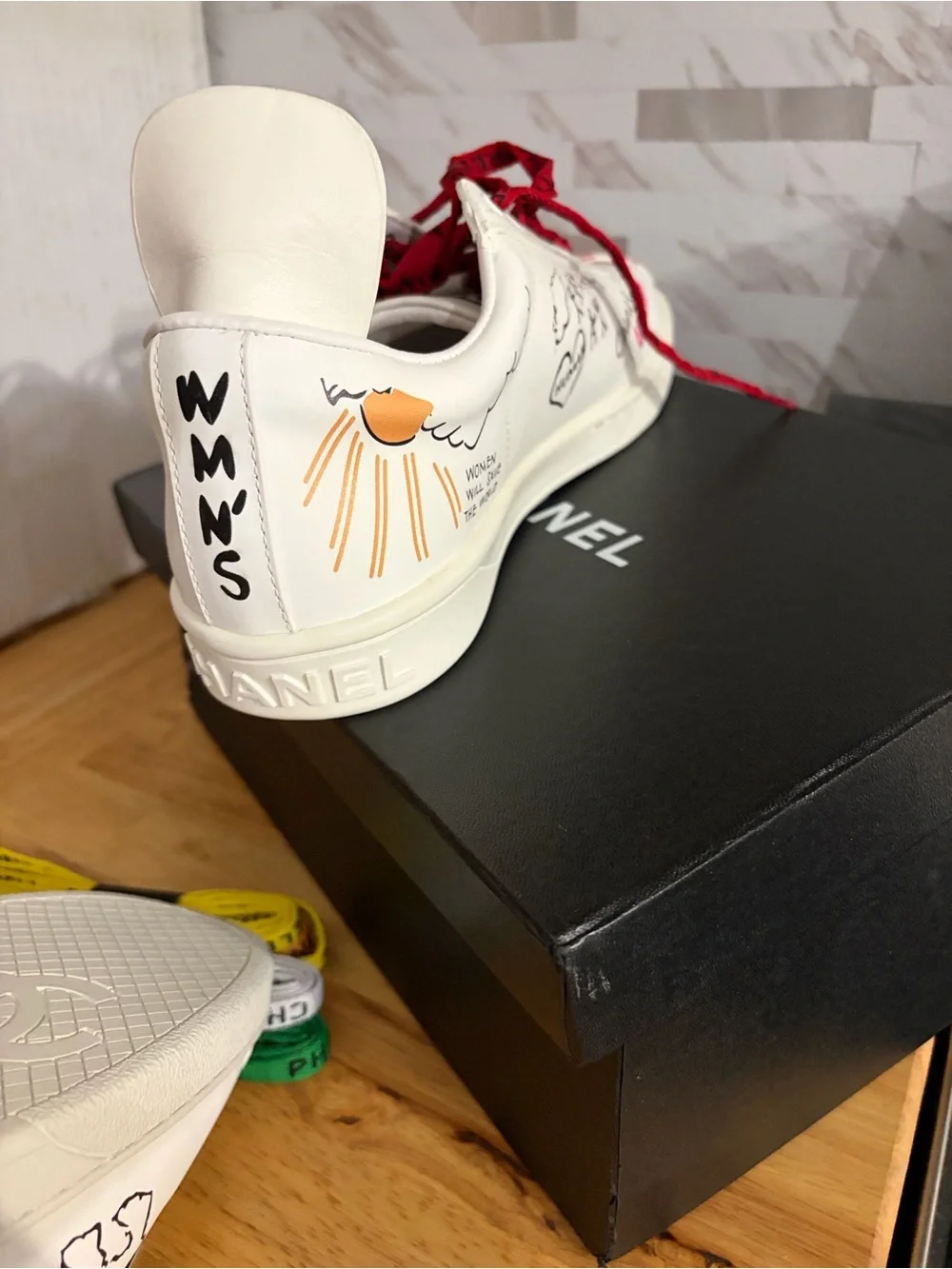 CHANEL White Kids Sneakers with Red and Navy Graphic Accents